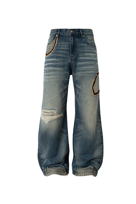 WHISKERED JEANS
